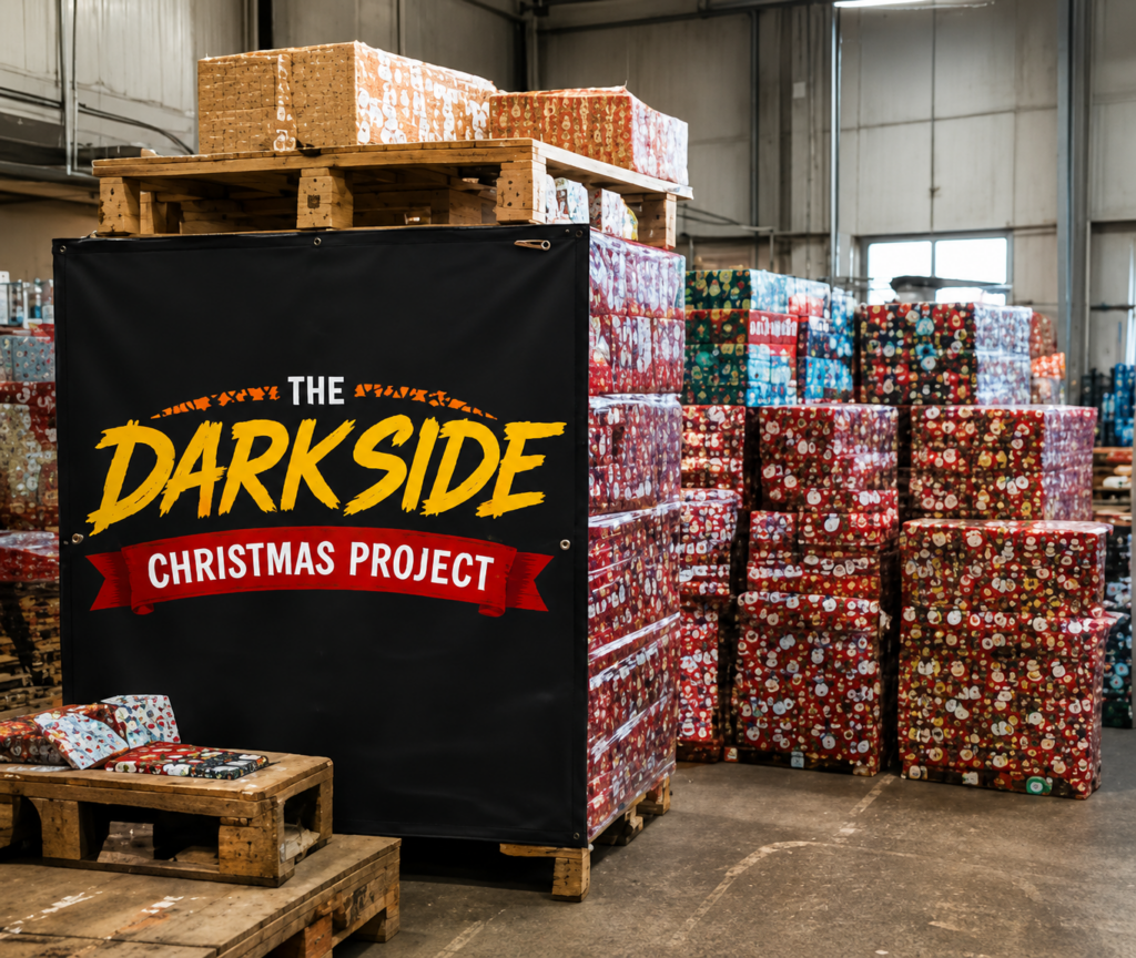 Wrapped Christmas gifts prepared for delivery by the Darkside Christmas Project